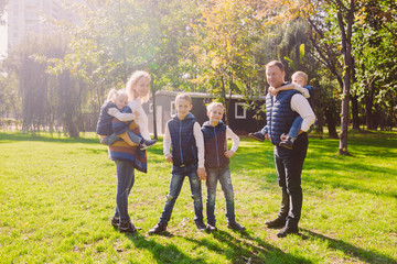 Theme family active leisure outside in nature. large Caucasian family with four children. Mom and...