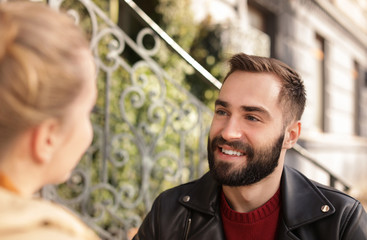 Lovely young couple spending time together outdoors