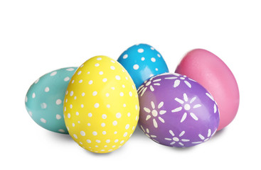 Bright painted Easter eggs on white background