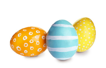 Bright painted Easter eggs on white background