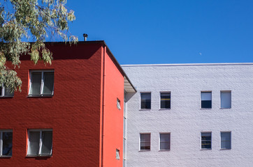 building with blue sky and clouds