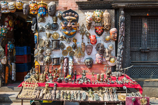 Wooden masks and handicrafts on sale at shop in the Thamel market, Thamel District of Kathmandu, Nepal.