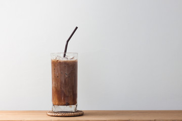 Ice coffee on wooden table