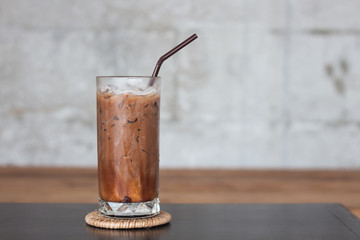Ice coffee on wooden table