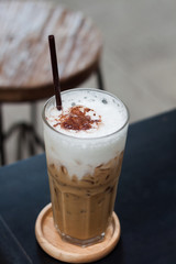 Ice coffee on wooden table