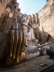 Big Buddha statue in ancient temple in Thailand