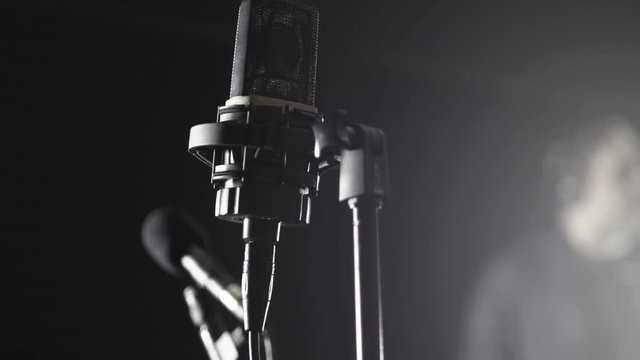 Saxophone. Man musician playing an instrument in a studio.