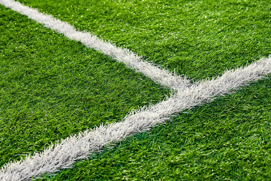Painted White Lines Of Green Artificial Turf On Soccer Field.