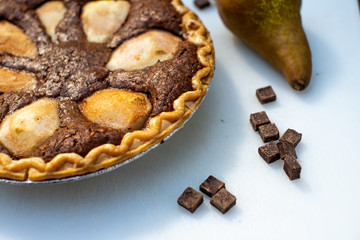 chocolate pear pie on white background