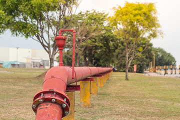Firefighters tools fire extinguisher and red fire hose, accessories and equipment for fire fighting in factory