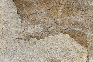 Old weathered masonry wall as a textured background