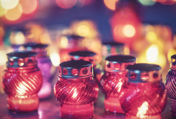 Laying candles in memory of those killed in disasters, war and global cataclysms