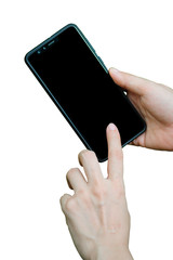 Close up young woman hand holding and touching screen on the modern black smartphone mock up with blank screen on beautiful grass background. Clipping path. Isolated on white background.