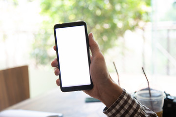 man hand holding the black smartphone with white blank screen - isolated on white background and clipping path