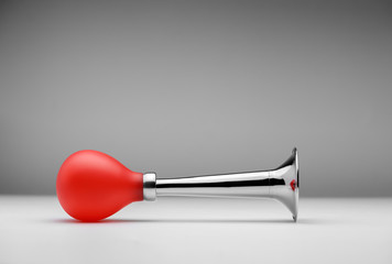 Air bicycle horn on a gray background