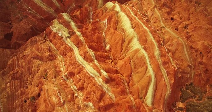 Aerial above view of colorful Danxia rock formations of The Zhangye National Geopark in Gansu province of China, 4k drone nature landscape footage