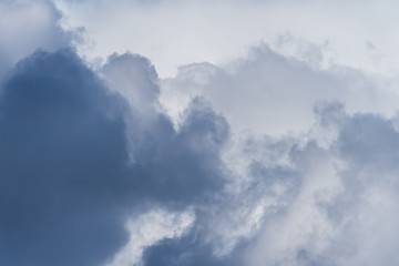 Gray overcast cloudy sky over horizon. Closeup clouds