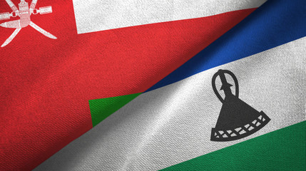 Oman and Lesotho two flags textile cloth, fabric texture