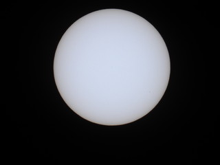 Sun with three sunspots, telescope, solar