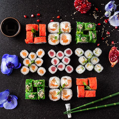 Rainbow Sushi Roll with salmon, eel, tuna, avocado, royal prawn, cream cheese Philadelphia