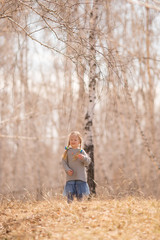 Naklejka na ściany i meble baby's walk in the birch grove of Russia