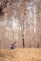 Naklejka na ściany i meble baby's walk in the birch grove of Russia