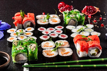 Rainbow Sushi Roll with salmon, eel, tuna, avocado, royal prawn, cream cheese Philadelphia