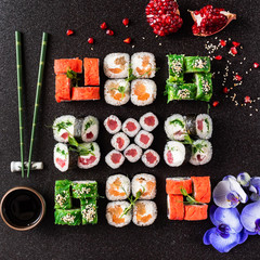 Rainbow Sushi Roll with salmon, eel, tuna, avocado, royal prawn, cream cheese Philadelphia