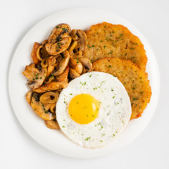 potato pancakes with egg and mushrooms