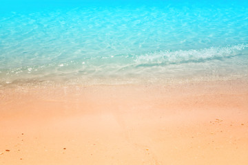 Fototapeta na wymiar blue sea and brown sand beach summer nature wallpaper background