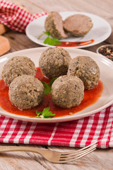 Meatballs with tomato sauce.