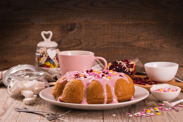 Cake with pink frosting.