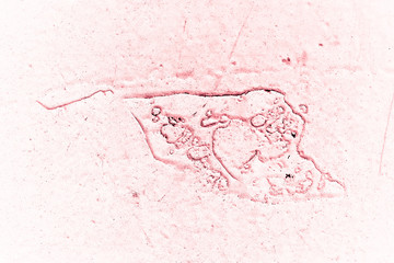 Vintage pink background. Rough painted wall of fiesta color. Imperfect plane of rosy colored. Uneven old decorative toned backdrop of rouge tint. Texture of pink hue. Ornamental stony surface.