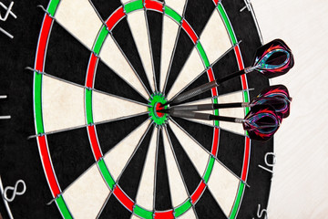 Target dart with arrows on light background, target marketing or successful business concept. Copy...