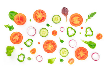 Fresh vegetable salad ingredients, shot from above on a white background. A flat lay composition with tomato, cucumber, peppers, onion slices and mezclun leaves