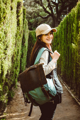 Young woman walking in the park labyrinth