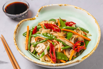 Chow Mein egg noodles with vegetables and mushrooms