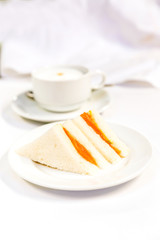 Salmon Club Sandwich isolated on a white background