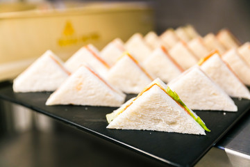 Salmon Club Sandwich isolated on a white background
