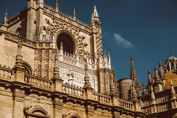 Fototapeta na wymiar Gothic exterior of the Cathedral of Saint Mary of the See Seville Cathedral in Seville, Andalusia, Spain