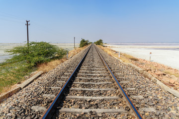 Obraz premium Railway along Sambhar Salt Lake. India