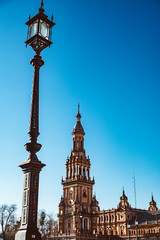 Fototapeta na wymiar Facades of buildings on the Spanish square or the Plaza de Espana. Andalusia.
