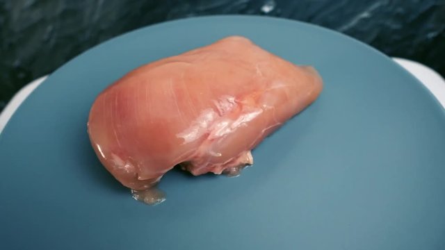 Portion of raw chickhen breast