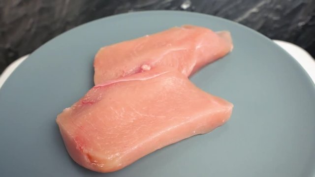 Portion of raw chickhen breast