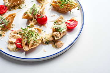 Stuffed pasta shells with Oregano & tomatoes