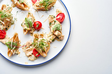 Stuffed pasta shells with Oregano & tomatoes