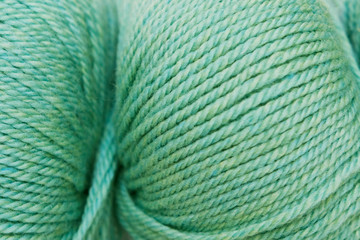 Abstract texture for background. Wool yarn close up. Neo mint colour of the year 2020