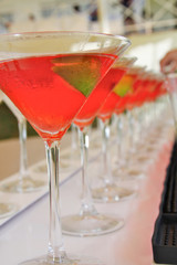 red cocktail on a bar