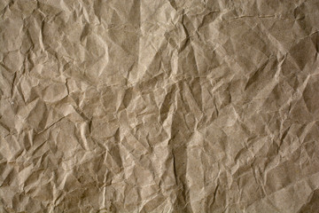 Background of rough crumpled paper. Abstract textural surface.