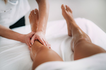 Fototapeta na wymiar Legs Sports Massage Therapy